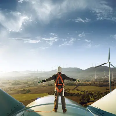 68C93faec4390348ac2a3d8b Who We Are Top Of Wind Turbine